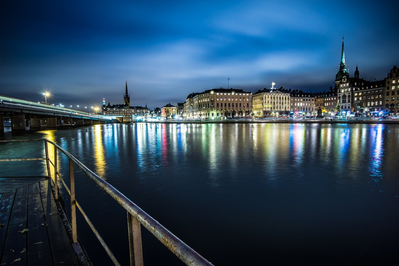 Stockholm's waterfront skyline reflected at night